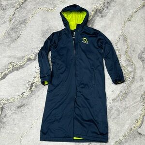 Waterproof parka. Good to use after swimming. Size 10-12 years